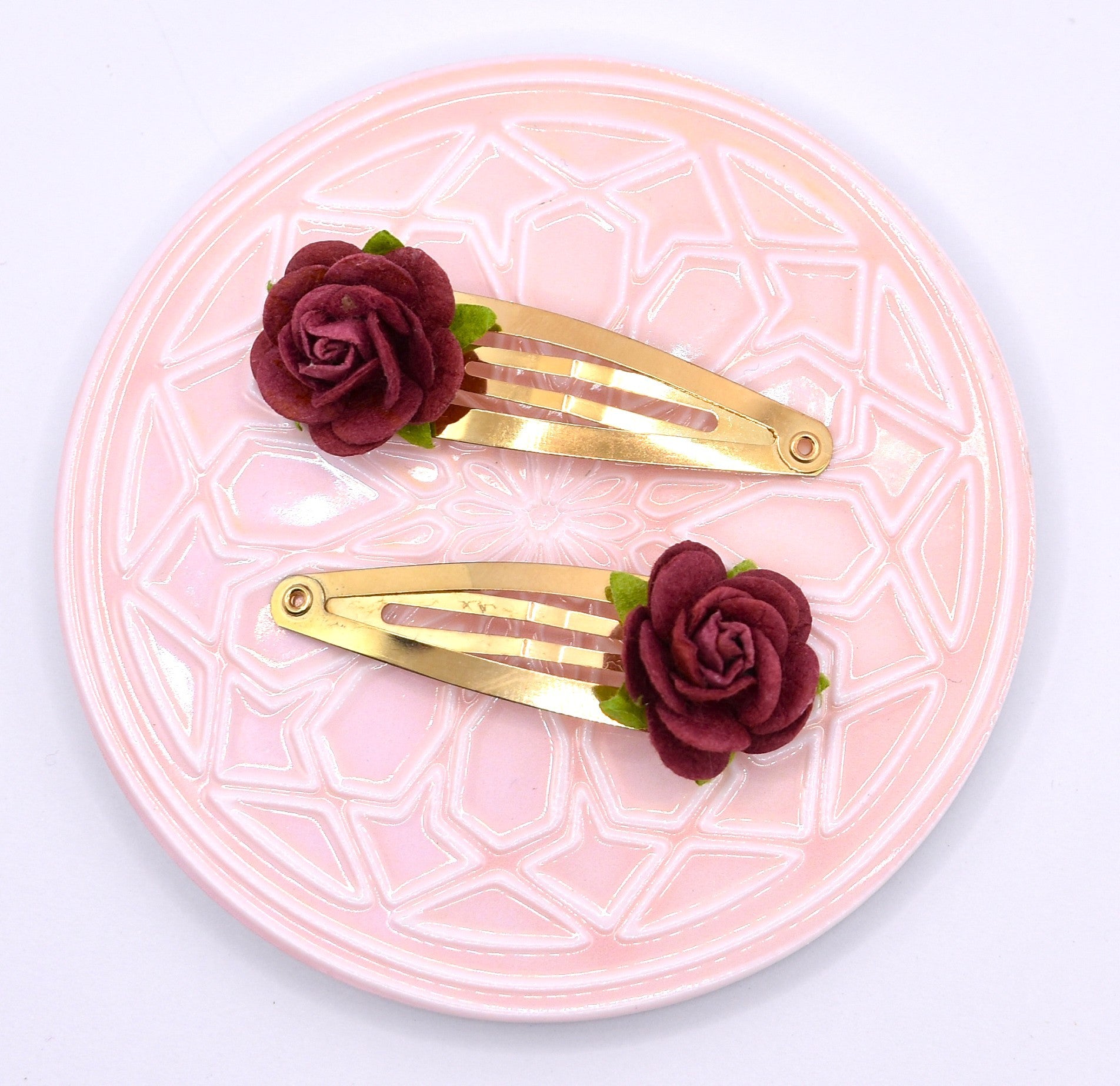 Rose gold snap clps with burgundy flowers