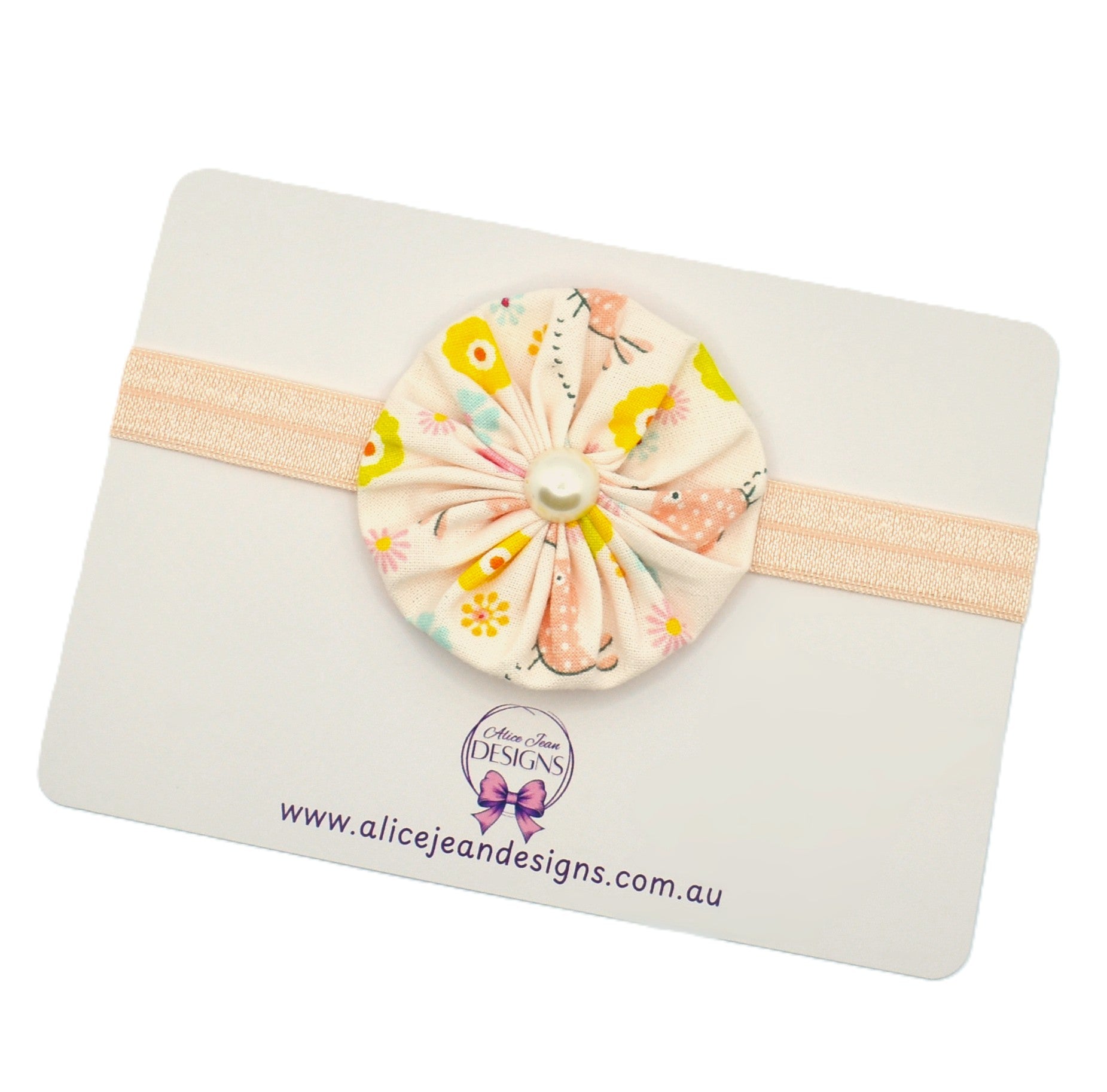 Newborn Headband - peach fabric yoyo